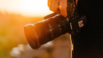 Camera hand photographer image 4k wallpaper