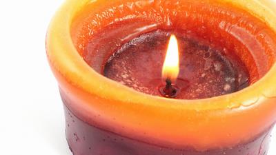Candle fire white background close u 4k wallpaper