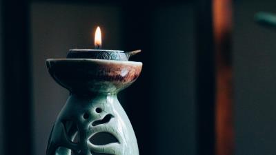 Candle stand flame 4k wallpaper