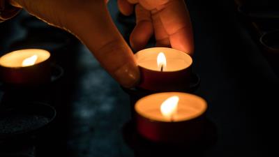 Candles hand dark 4k wallpaper