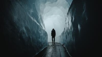 Cave man tunnel 4k wallpaper