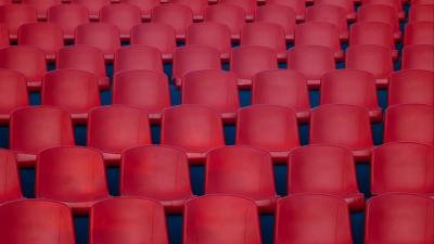 Chairs red rows 4k wallpaper