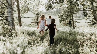 Children grass sunlight walk 4k wallpaper