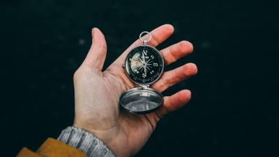 Compass hand travel image 4k wallpaper