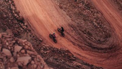 Cyclists road aerial view 4k wallpaper