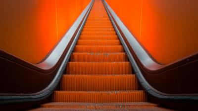 Escalator stairs orange 4k wallpaper