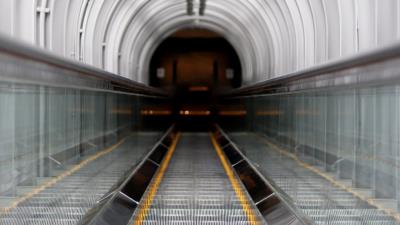 Escalator tunnel metro 4k wallpaper