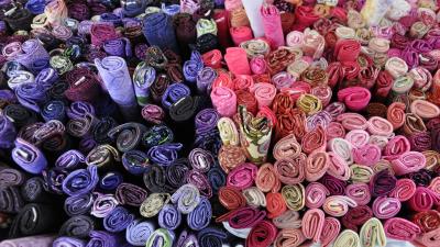 Fabric rolls multicolored texture 4k wallpaper