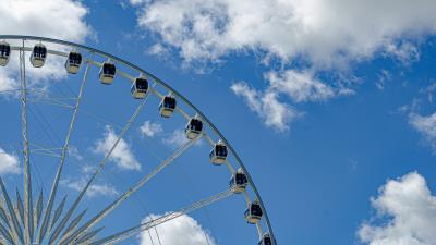 Ferris wheel attraction clouds 4k wallpaper