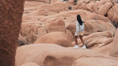 Girl rocks stones 4k wallpaper