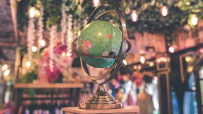 Globe stand map 4k wallpaper