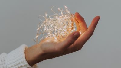 Hand garland glow 4k wallpaper