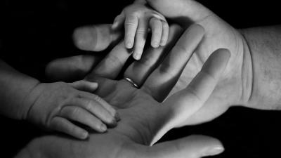Hands child family bw 4k wallpaper