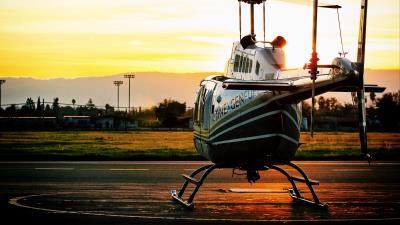 Helicopter sunset airfield 4k wallpaper