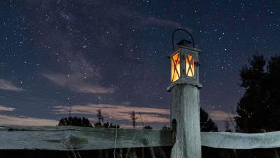 Lantern fence starry sky 4k wallpaper