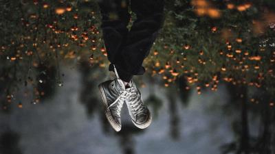 Legs sneakers field flowers blur 4k wallpaper