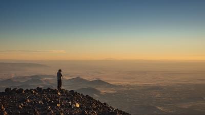 Man hill stones 4k wallpaper