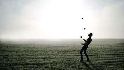 Man silhouette juggling 4k wallpaper