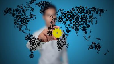 Mechanism system gears planet map man hand 4k wallpaper