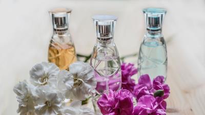 Perfume flowers bottles 4k wallpaper