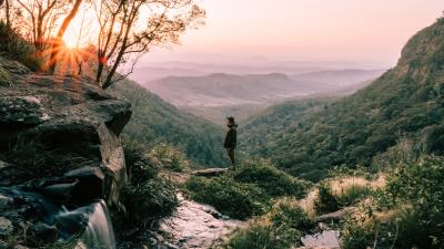 Person mountains fog 4k wallpaper