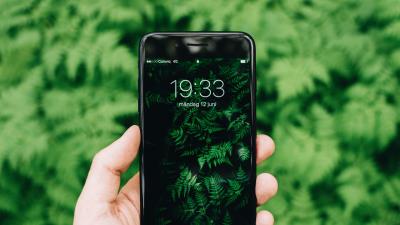 Phone hand grass 4k wallpaper