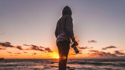 Photographer sea sunset 4k wallpaper