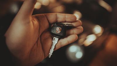 Porsche keys hand 4k wallpaper