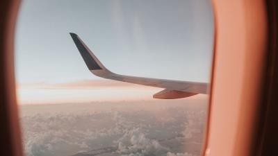 Porthole airplane window aircraft wing 4k wallpaper