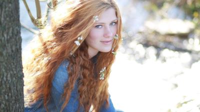 Women face long hair wind white flowers bokeh 8k wallpaper