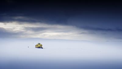 Alone house on top of ice mountains wallpaper