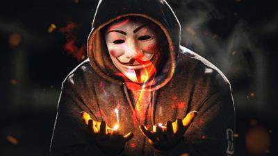 Anonymus guy with flame in hand 4k js wallpaper