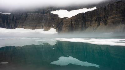 calm blue reflections grinnell lake at glacier national park 4k ro wallpaper