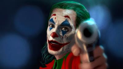 joker with gun 4k 8y wallpaper
