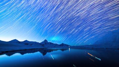 Star trails snow mountains 4k wallpaper