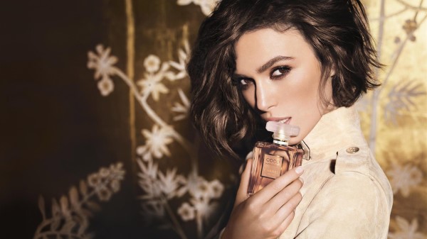 Keira Knightley With A Chanel Perfume Wallpaper