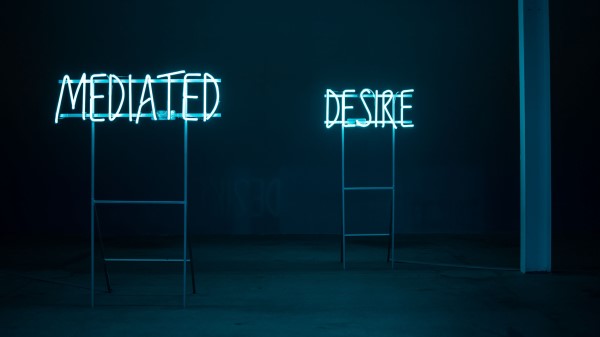 Desire Neon Inscription wallpaper