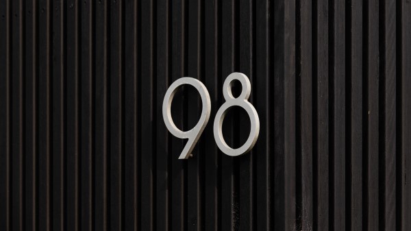 Figure Fence Inscription Wallpaper