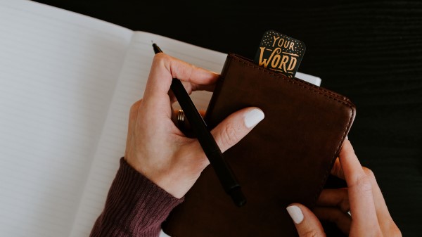 Hands Notebook Inscription Wallpaper