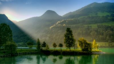 Sunlight Over Mountain Lake wallpaper