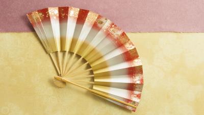 hand fan yellow orange wallpaper