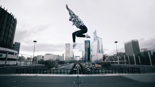 Human Roof Jump Wallpaper