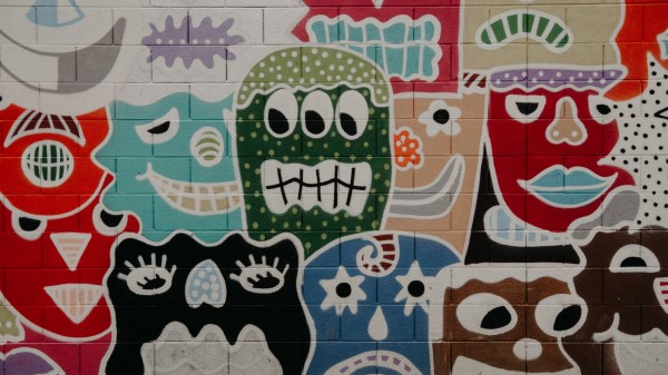 Art Graffiti Wall Faces Wallpaper