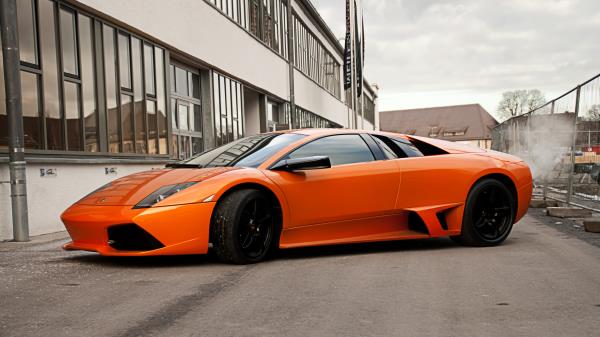 Lamborghini Murcielago Lp640 Orange Side View Black Wheels Building Wallpaper