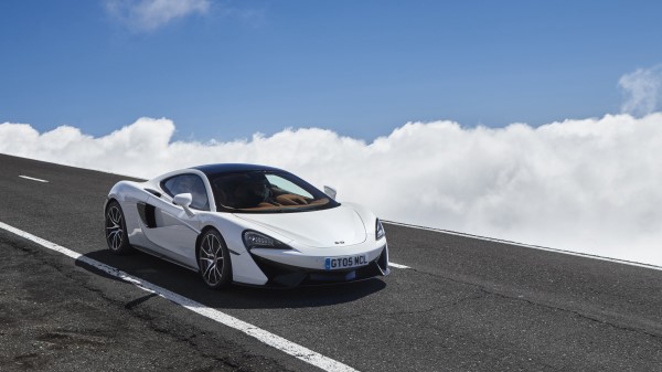 Mclaren 570gt Side View Road Wallpaper