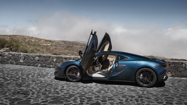 Mclaren 570gt Side View Sportscar Wallpaper