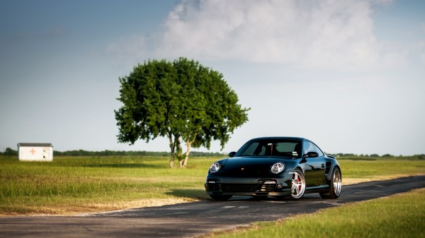 Porsche 911 Turbo 997 Black Front Tree Sky wallpaper