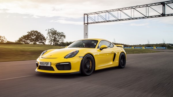 Porsche Cayman Gt4 Yellow Side View wallpaper