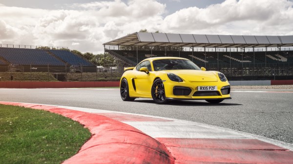 Porsche Cayman Gt4 Yellow Side View Wallpaper wallpaper