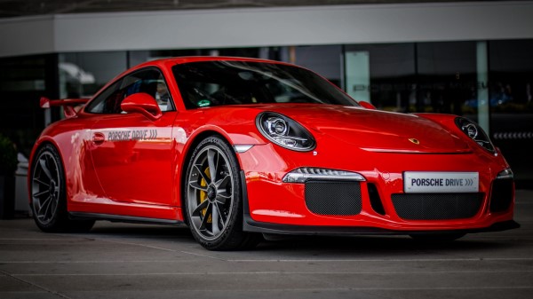 Sports Car Side View Red Lights Wallpaper